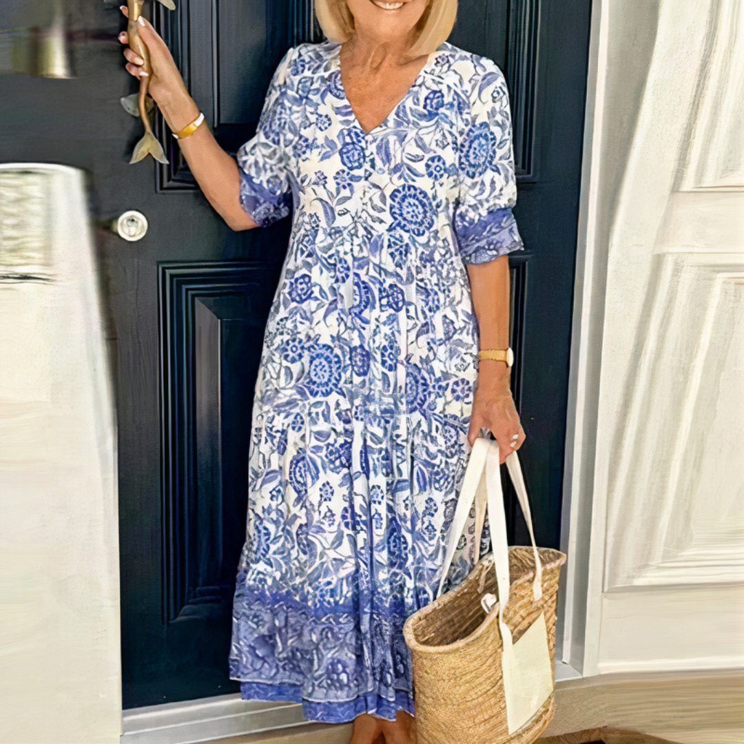 Robe d'été bohème midi à fleurs pour femme, idéale pour un look romantique et léger en été.         